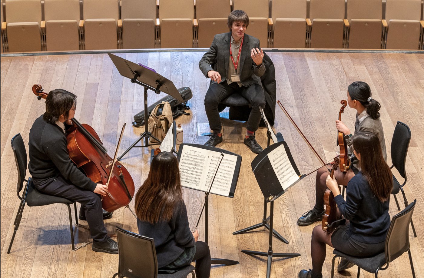 String quartet working with a coach in a masterclass